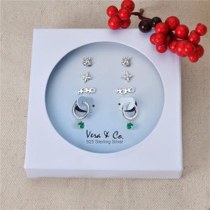 Sterling Silver Holiday Earring Set of Hoho Wording Stud. Starburst Stud. Jingle Bell Stud. A Drop of Green CZ Huggie Hoop